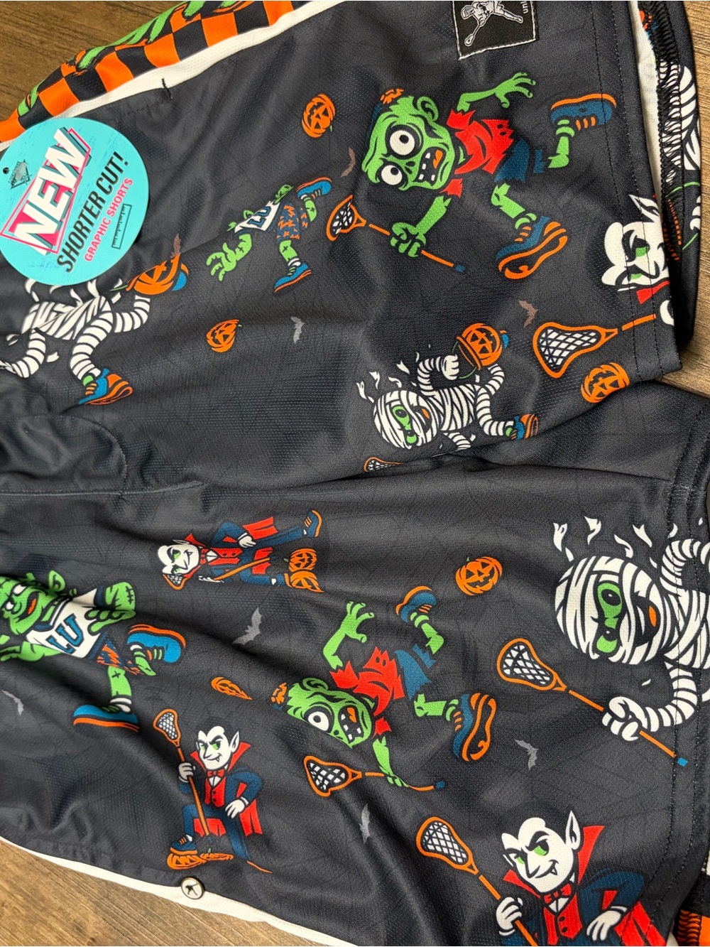 Kids Halloween Lacrosse Shorts - Black with Green & Orange Characters